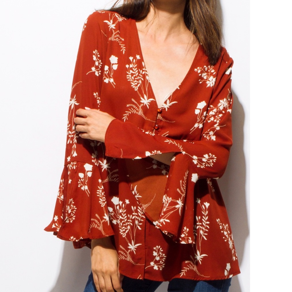 Burnt Orange flowered print Lightweight shirt. Deep v neck.